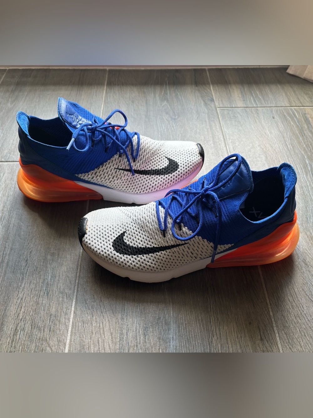 Nike Air Max 27C Racer Blue, White, and Orange Athletic Shoes